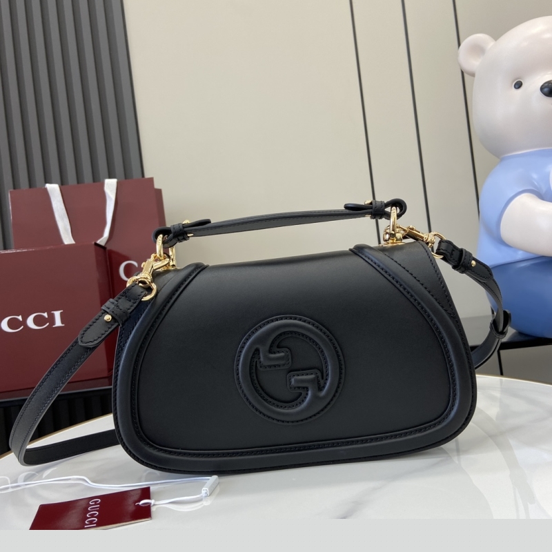 G*u*i top handle bags
